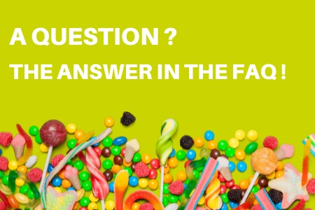 front-close-view-candy-composition-different-colored-candies-with-marshmallow-white-desk.jpg