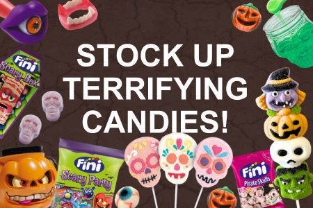 front-close-view-candy-composition-different-colored-candies-with-marshmallow-white-desk.jpg